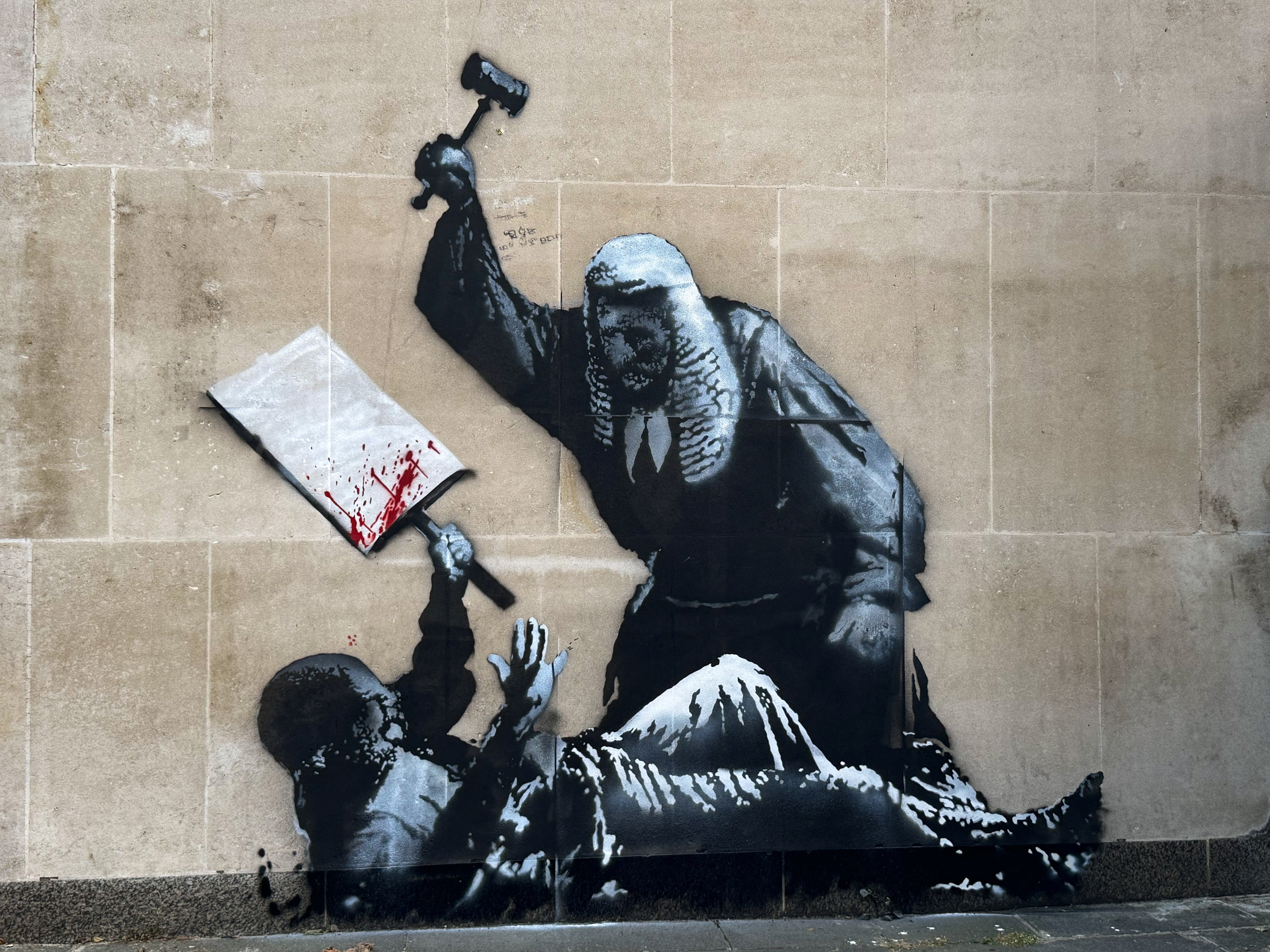 Banksy's protest mural removed from historic London court