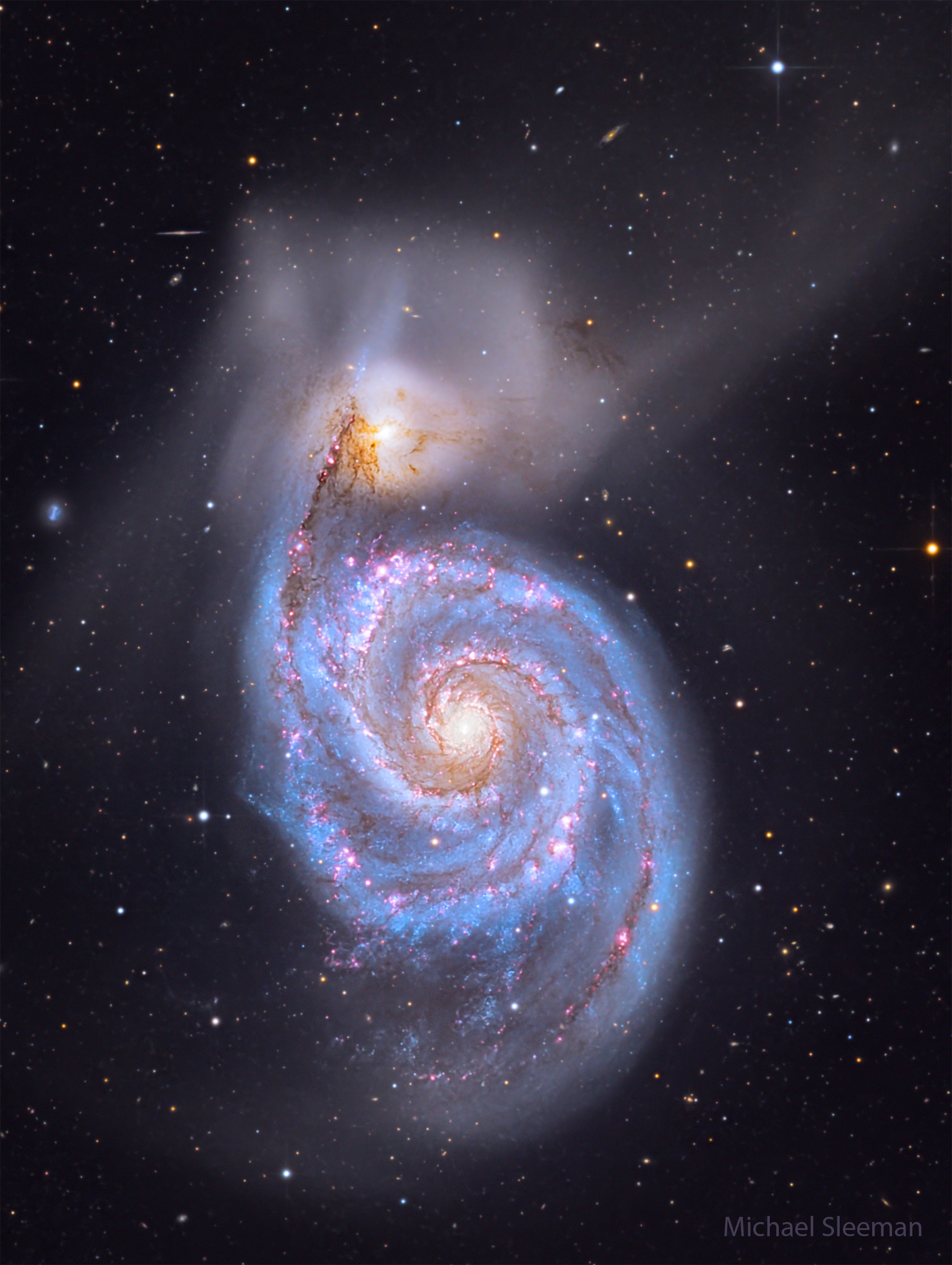 NASA公開のM51写真望遠鏡で渦巻腕と星生成を捉える - ChosunBiz