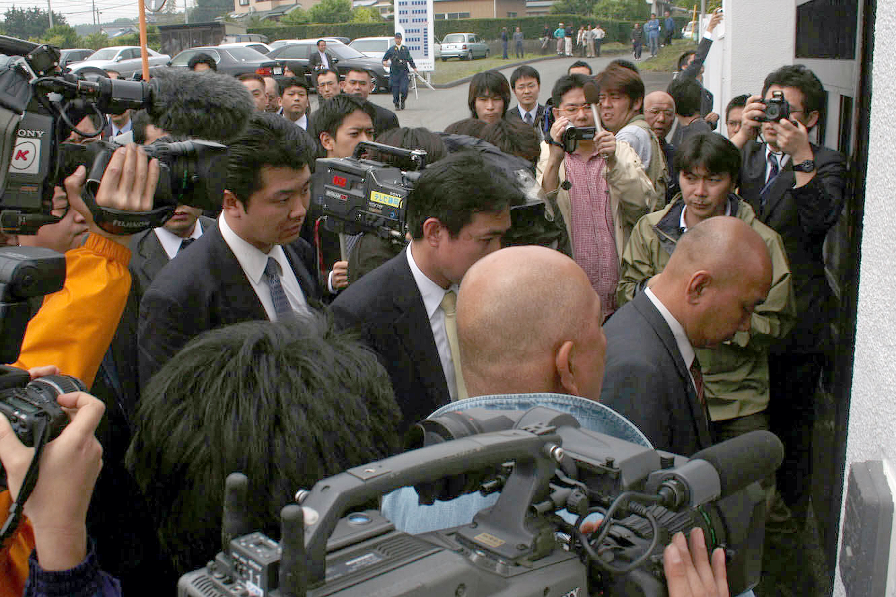 後藤 忠政