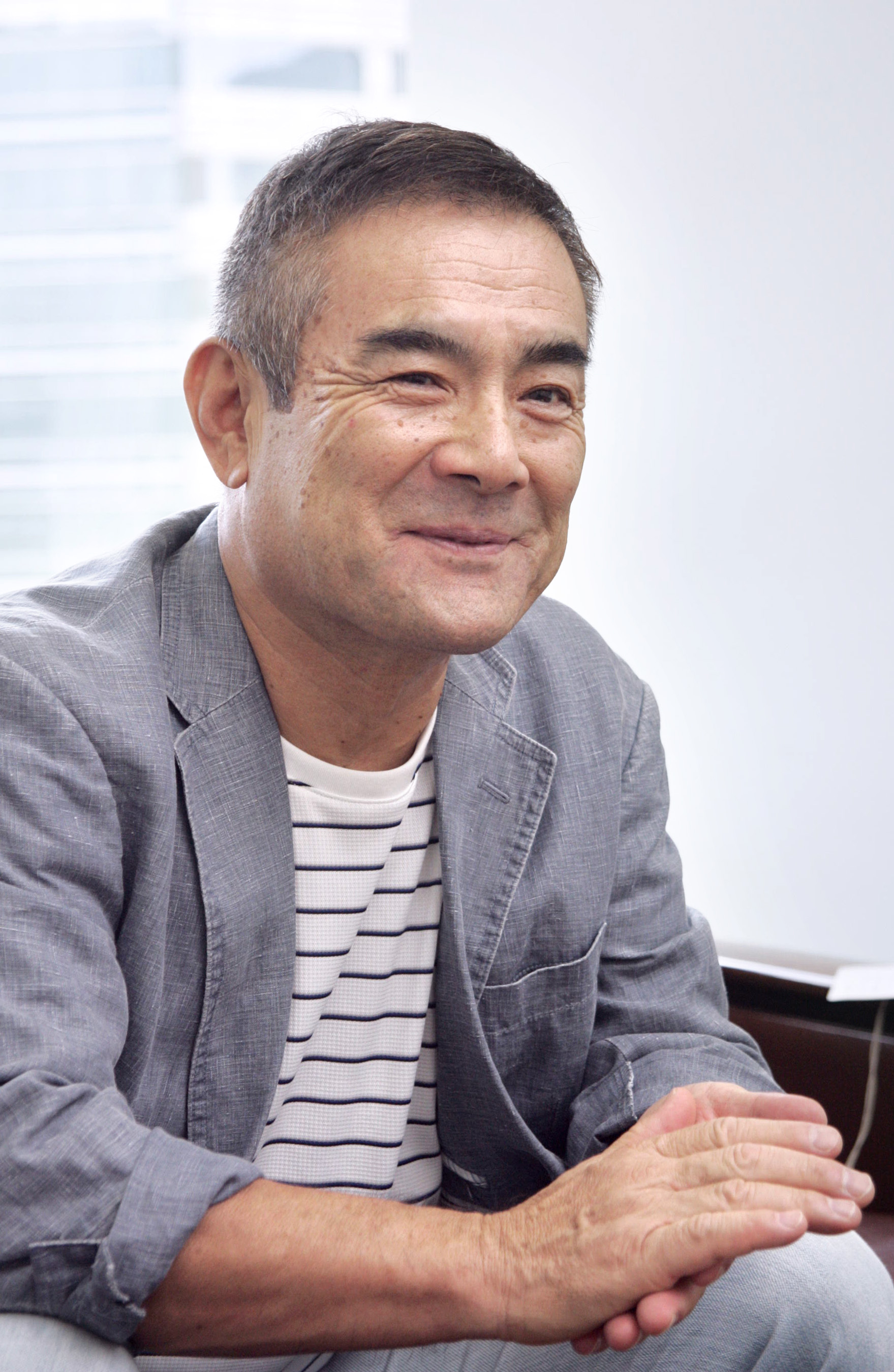 辻 萬 長