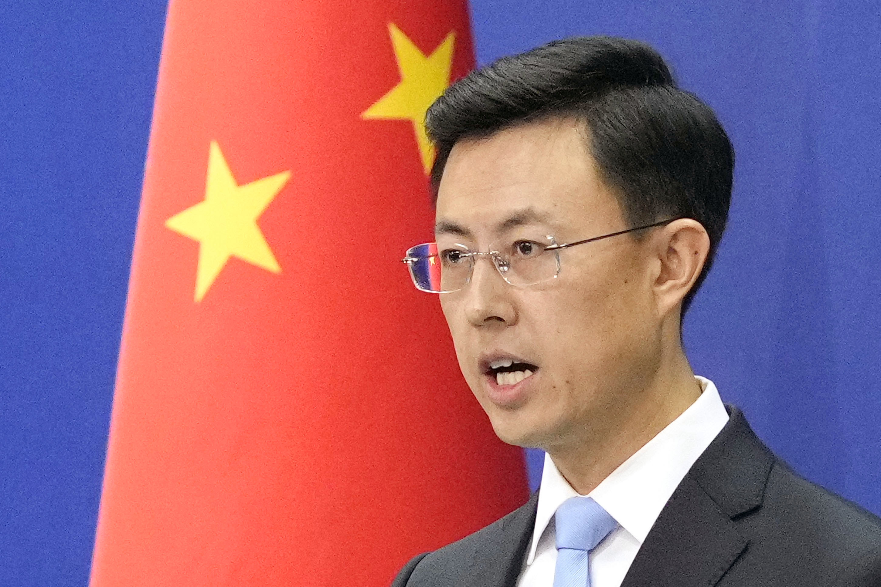 中国 報道 官
